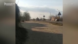 Man Tries To Stop Russian Military Convoy With His Bare Hands