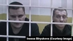 Filipp Romanov (left) and Sergei Bulanov in the courtroom during their trial last year