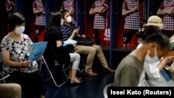 Oko 59 odsto Japanaca je potpuno vakcinisano. U Japanu je registrovano 1,69 miliona slučajeva i 17.641 smrtni slučaj od COVID-19 (Foto: Kobe, jun 2021)