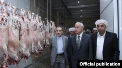 Armenia-Agriculture Minister Sergo Karapetian (C) and Iranian Ambassador Mohammad Reisi inaugurate a halal slaughterhouse in Masis, 2 Sept2015