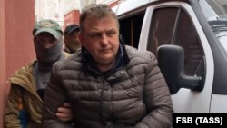 UKRAINE -- Vladislav Yesypenko, Vladislav Yesypenko, who holds dual Russian-Ukrainian citizenship and is a freelance contributor Crimea.Realii, is detained by FSB officers in Crimea, March 16, 2021