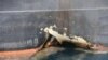 A damaged ANDREA VICTORY ship is seen off the Port of Fujairah, May 13, 2019