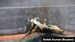  A damaged ANDREA VICTORY ship is seen off the Port of Fujairah, May 13, 2019