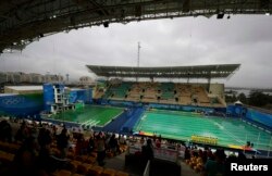 Олимпиада жарыстары өтіп жатқан бассейндегі судың түсі жасыл болып өзгеріп кетті. Рио, 10 тамыз 2016 жыл.
