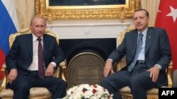 Chums: Turkish Prime Minister Recep Tayyip Erdogan (right) meets with his Russian counterpart, Vladimir Putin, in Ankara on August 6.