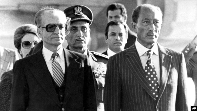 The Shah in Egypt with Anwar Sadat after his exile.