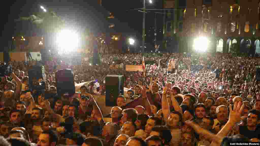 Thousands of protesters massed outside Georgia's parliament in central Tbilisi after Russian lawmaker Sergei Gavrilov took the speaker's seat inside the parliament. Gavrilov is viewed as an ally of Russian President Vladimir Putin. 
