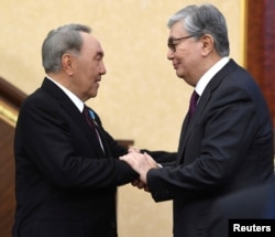 Нурсултан Назарбаев и Касым-Жомарт Токаев (слева) в марте 2019 года
