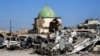 A picture taken in July shows the dome of the destroyed Al-Nuri Mosque in the Old City of Mosul, a year after the town was retaken by Iraqi government forces.