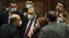 Armenia -- Edmon Marukian (L), the leader of the opposition Bright Armenia Party, talks to senior pro-government lawmakers on the parliament floor, Yerevan, January 18, 2021.