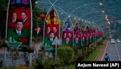 Banners along a highway in Islamabad ahead of Xi Jinping's first visit to Pakistan in 2015.