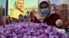 Afghan women sort saffron flowers in Herat, Afghanistan in November.