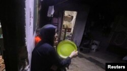 Fotografija Palestinke u izbegličkom naselju u pojasu Gaze