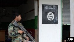 آرشیف: نیروهای افغان در ولسوالی کوت ننگرهار/ Source: AFP
