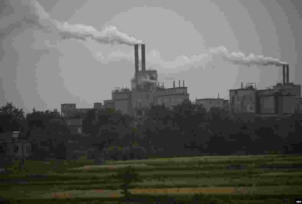 A cement factory near Changshu, China (epa) - The Stern report calculates that even if Britain were to shut down all its power stations tomorrow, the reduction in global emissions would be wiped out in just a year by increased emissions from China.