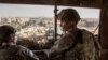 U.S. Army soldiers keep watch on the U.S. Embassy compound in Baghdad on January 1.