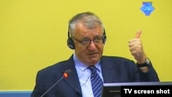 A screen grab from courtroom television of Serbian politician Vojislav Seselj on June 18, during his trial in The Hague for inciting atrocities