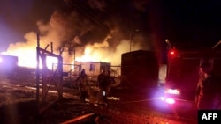 A photograph taken and released by the Nagorno-Karabakh Human Rights Ombudsman shows a fire at a fuel depot outside Stepanakert on September 25, 2023.