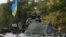 Українські військовослужбовці на бронетранспоритері біля Дебальцевого, Донецька область, 29 серпня 2014 року