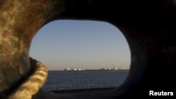 Iran -- A general view of an oil dock is seen from a ship at the port of Kalantari in the city of Chabahar, 300km (186 miles) east of the Strait of Hormuz, January 17, 2012
