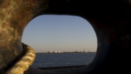 Iran -- A general view of an oil dock is seen from a ship at the port of Kalantari in the city of Chabahar, 300km (186 miles) east of the Strait of Hormuz, January 17, 2012
