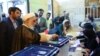 Ali Akbar Nategh-Nouri casts his vote during the presidential election in Tehran, Iran, May 19, 2017