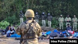 More than 30 migrants have been stuck on the border for more than three weeks between armed Belarusian guards on one side and armed Polish forces on the other.