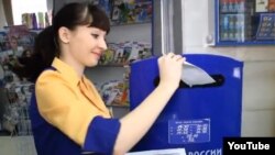 A still from the video by Kira Sheveleva, Russian Post worker in Bely Yar, for an employee-of-the-year contest.