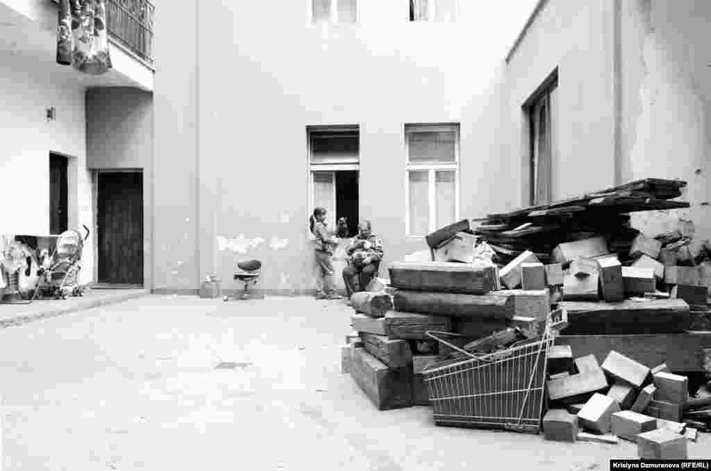 The courtyard of the Cina family&#39;s apartment in Zizkov, a run-down but vibrant neighborhood in Prague with a high concentration of Romany inhabitants.