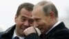 Президент Владимир Путин и председатель правительства Дмитрий Медведев