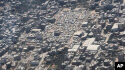 ქალაქ ღაზის რაიონი, რომლის ერთ ნაწილში უსახლკაროდ დარჩენილთა კარვებია გაშლილი