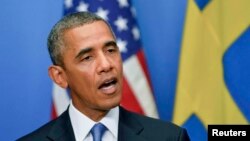 U.S. President Barack Obama speaking at a news conference in Sweden