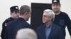 Armenia - Former President Serzh Sarkisian talks to his lawyer during his trial in Yerevan, February 25, 2020.