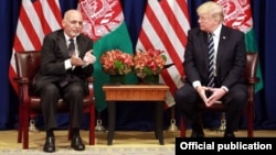 U.S. President Donald Trump (left) with Afghan President Ashraf Ghani in New York on September 21.