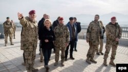 German Defense Minister Ursula von der Leyen (second from left) is shown during a visit to Camp Marmal in Mazar-e Sharif in 2015.