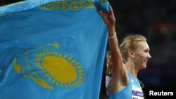 Ольга Рыпакова из Казахстана победила в состязаниях в тройном прыжке. Лондон, 5 августа 2012 г
