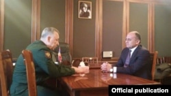 Armenia - Defense Minister Seyran Ohanian (R) and Russian First Deputy Defense Minister Arkady Bakhin, meet in Gyumri to discuss a deadly shooting spree attributed to a Russian soldier,13Jan2015.