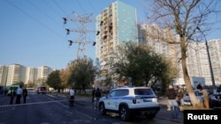 Police block off the area near a damaged residential building following an alleged Ukrainian drone attack in Ramenskoye, in the Moscow region, overnight on September 9-10. 