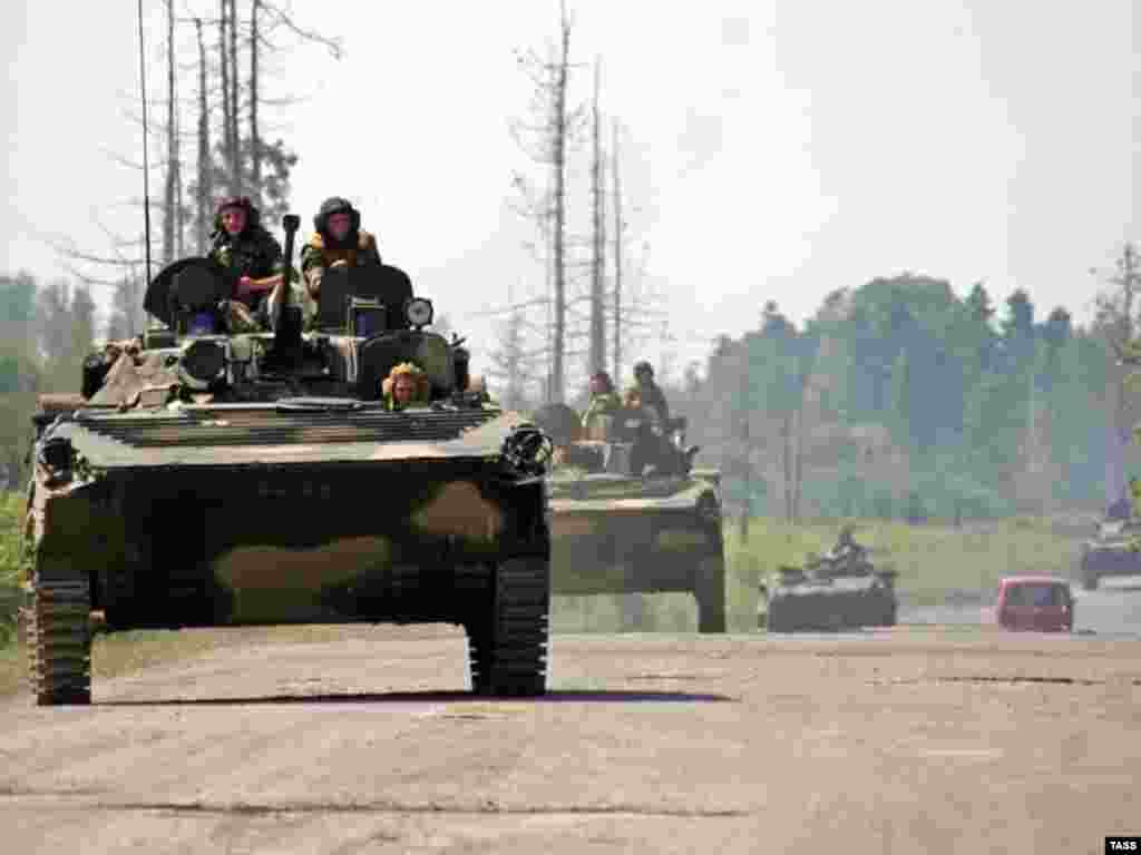 Title ENG: 2008 Georgian - Abkhazian conflict: August 11 Caption: ITAR-TASS 136: ABKHAZIA. AUGUST 11. Column of Russian armoured vehicles move along a country road in Gali District, Abkhazia.