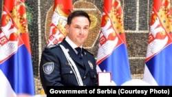 Veselinu Miliću, uhapšenom šefu beogradske policije, Aleksandar Vučić uručio je orden "Miloš Obilić" 28. juna 2021. godine u Beogradu.