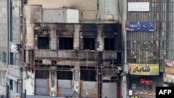 بنای سوخته در تظاهرات ایران - آرشیف 