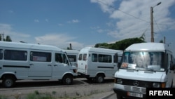 Minibuses in Kyrgyzstan. Fixed-route taxis are common throughout the former Soviet Union.