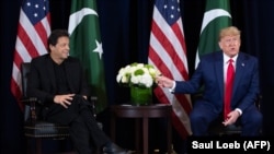 U.S. President Donald Trump (R) and Pakistani Prime Minister Imran Khan hold a meeting on the sidelines of the UN General Assembly in New York, September 23, 2019