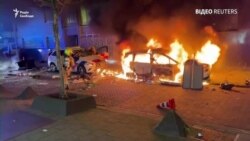 Розгромлені крамниці та автівки у вогні: Європа спалахнула антиковідними протестами – відео