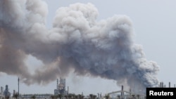 Smoke rises after an attack on the Bapco refinery in Bahrain, one of the Gulf nations targeted by Iran.
