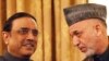 Afghan President Hamid Karzai (right), pictured meeting with his Pakistani counterpart Asif Ali Zardari, says the two countries "have a new relationship."