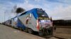 A train gets moving during the inauguration of a new line linking eastern Iran and western Afghanistan at a railway station in the Iranian town of Khaf on December 10. 