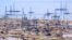 Oil derricks on the shore of the Caspian Sea just outside the Azerbaijani capital, Baku.