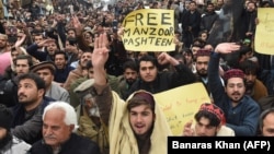 Supporters of the Pashtun Tahafuz Movement leader Manzoor Pashteen shout slogans during a protest against his detention in the southwestern city of Quetta on January 28.