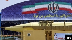 State radio said a longer-range, Shahab-3 missile test, like this one seen at a military parade on September 22, would be tested within hours of the short-range tests.